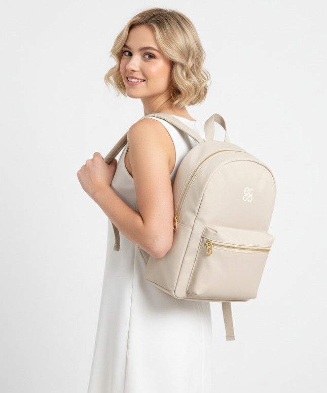 Mini backpack. Its smooth, water-resistant exterior.